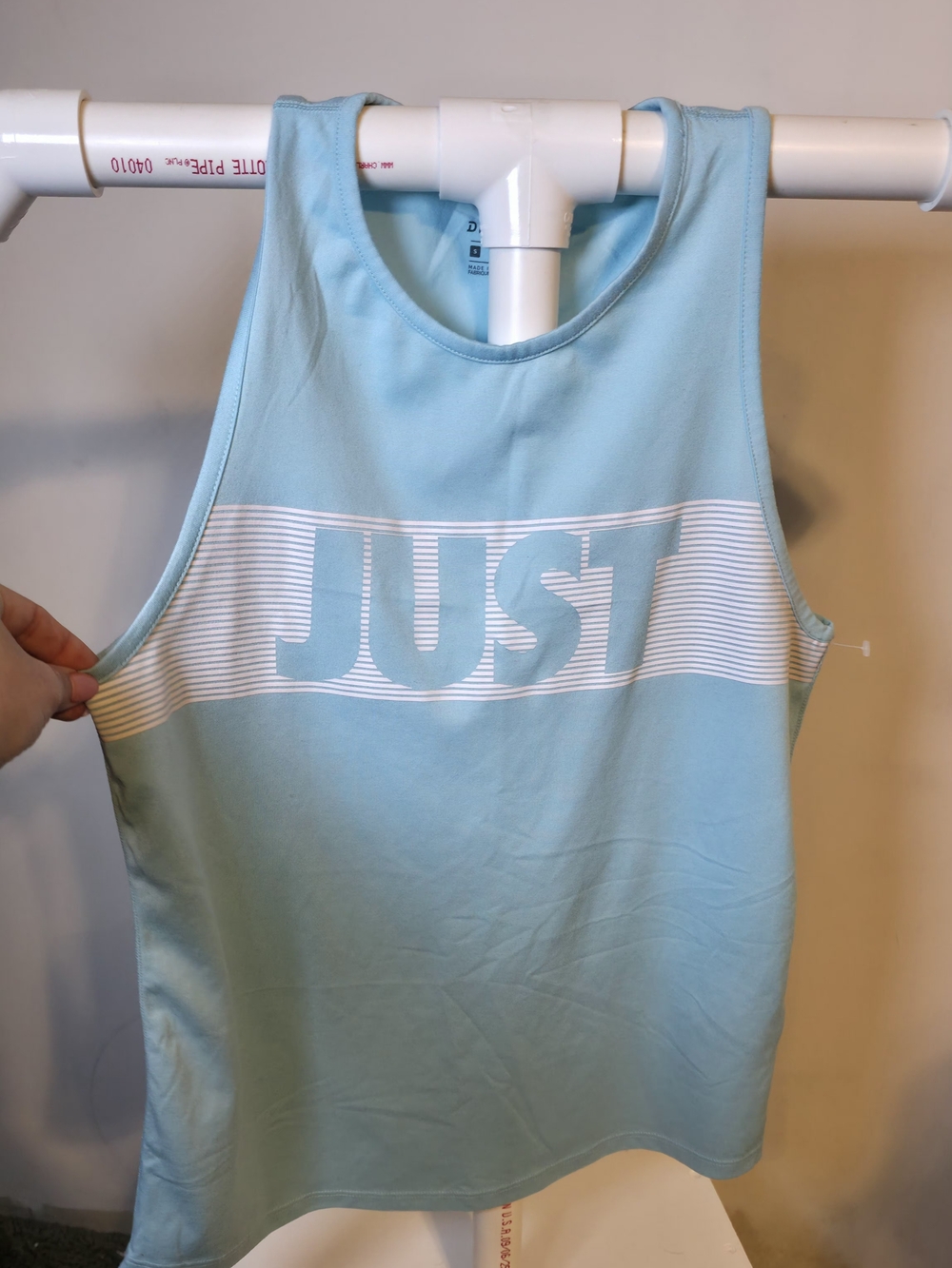 Nike Light Blue Tank Top with White 'JUST' Graphic